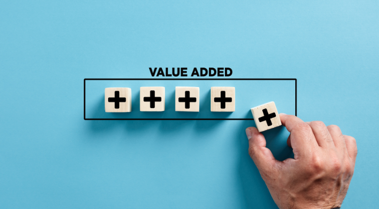 Illustration of a hand adding plus signs to a box labeled "value added."