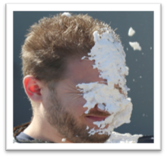 Pie in manager's face