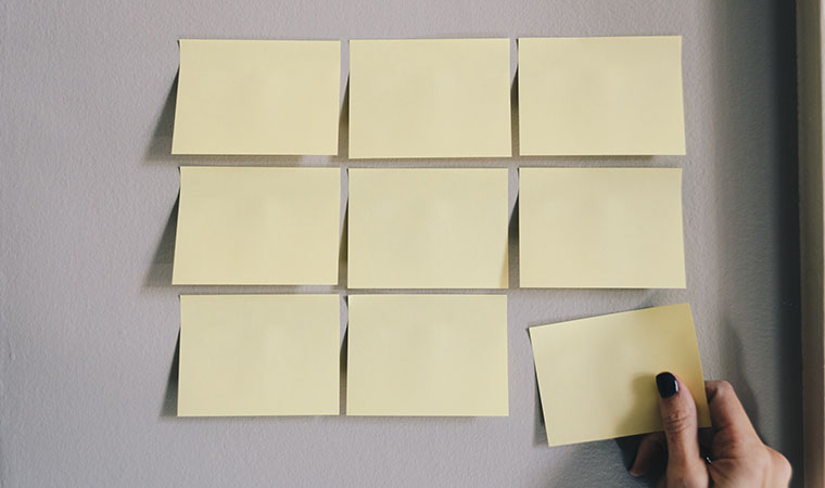 Sticky notes arranged on a wall.