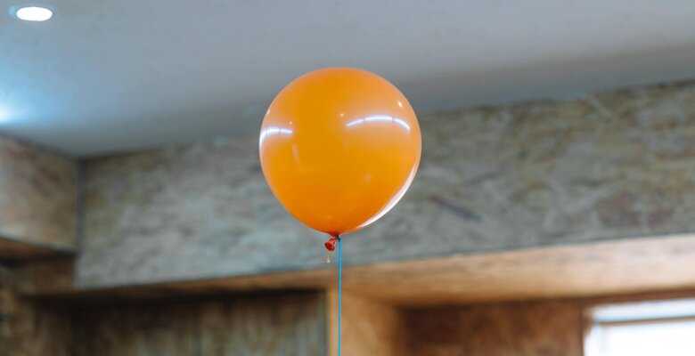 Orange balloon in an office