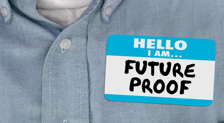 Photo of a casual businessperson with a name sticker saying "Hello I am Future Proof."