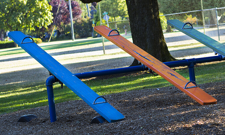 Image of a playground see-saw.