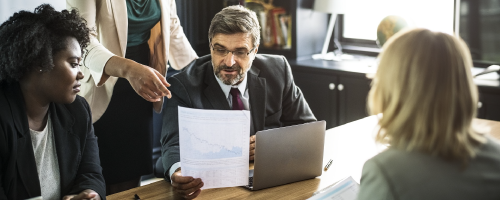 Contact Center Strategy Brochure image - executives discussing