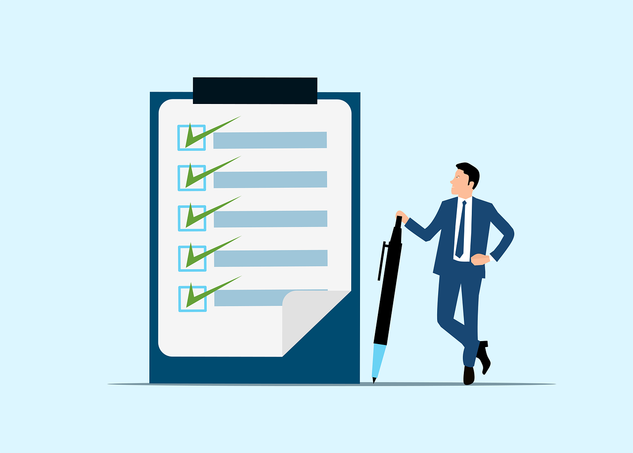 Illustration of a businessperson in a suit leaning on a large pen, standing next to an oversized checklist on a clipboard with all items marked completed with green checkmarks.