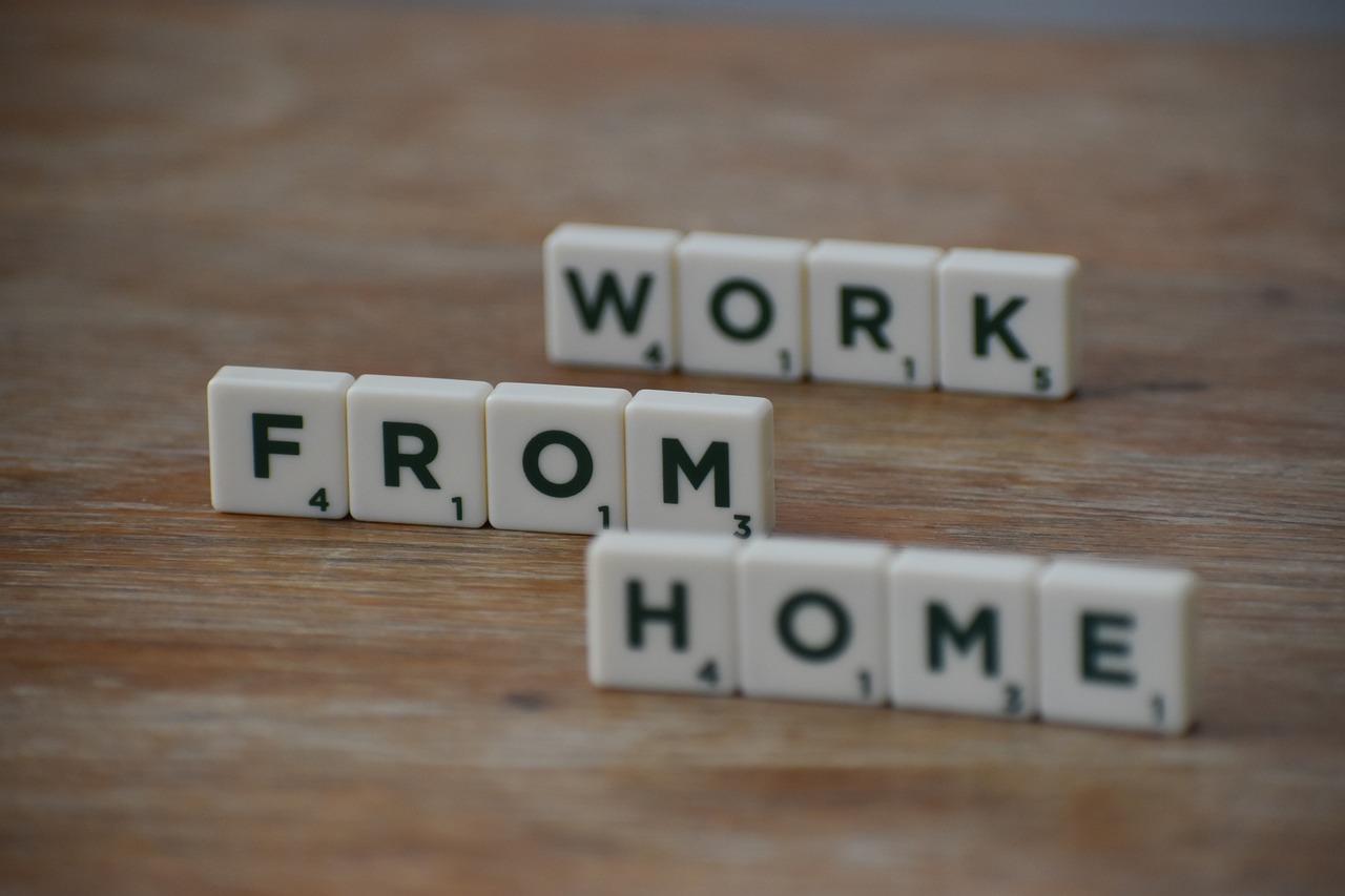 scrabble tiles on a table that say: work from home
